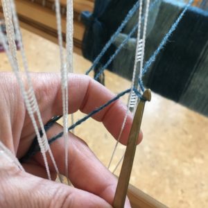 picture of threading the heddles