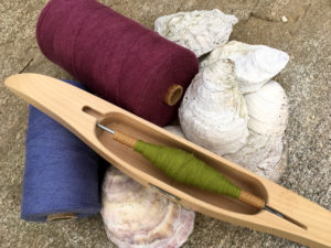 Header image of yarn and shuttle